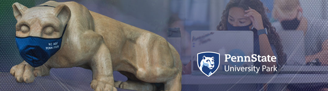 Penn State University Park. Penn State Nittany Lion Shrine wearing protective mask. Masked Students in campus computer lab in background. 